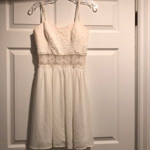 Cream lace dress.
